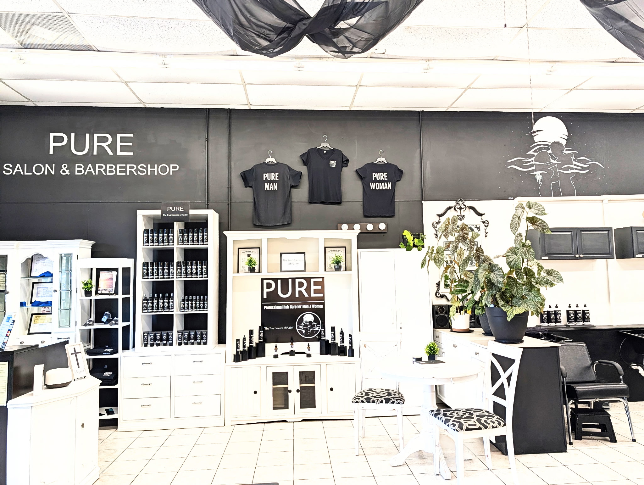 Reception and retail area at PURE Salon & Barbershop